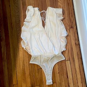 Ruffled body suit